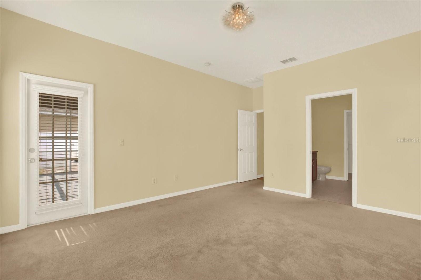 Primary bedroom - owners suite- lanai access