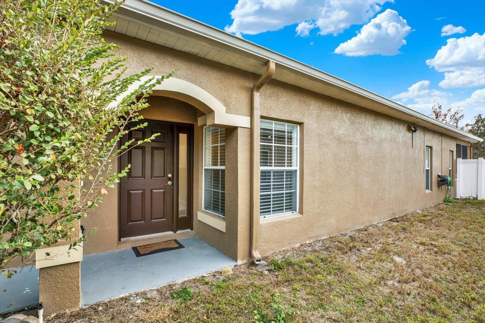 Entrance of 12631 Chenwood Ave in gated community
