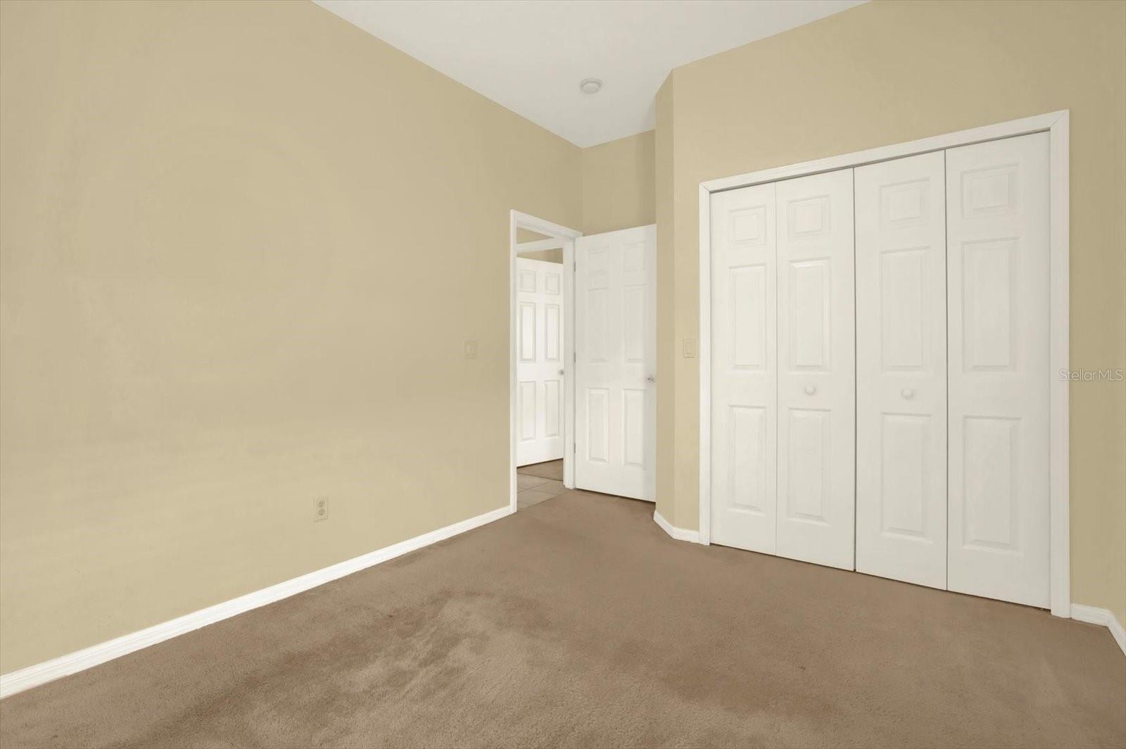 Secondary bedroom with natural light