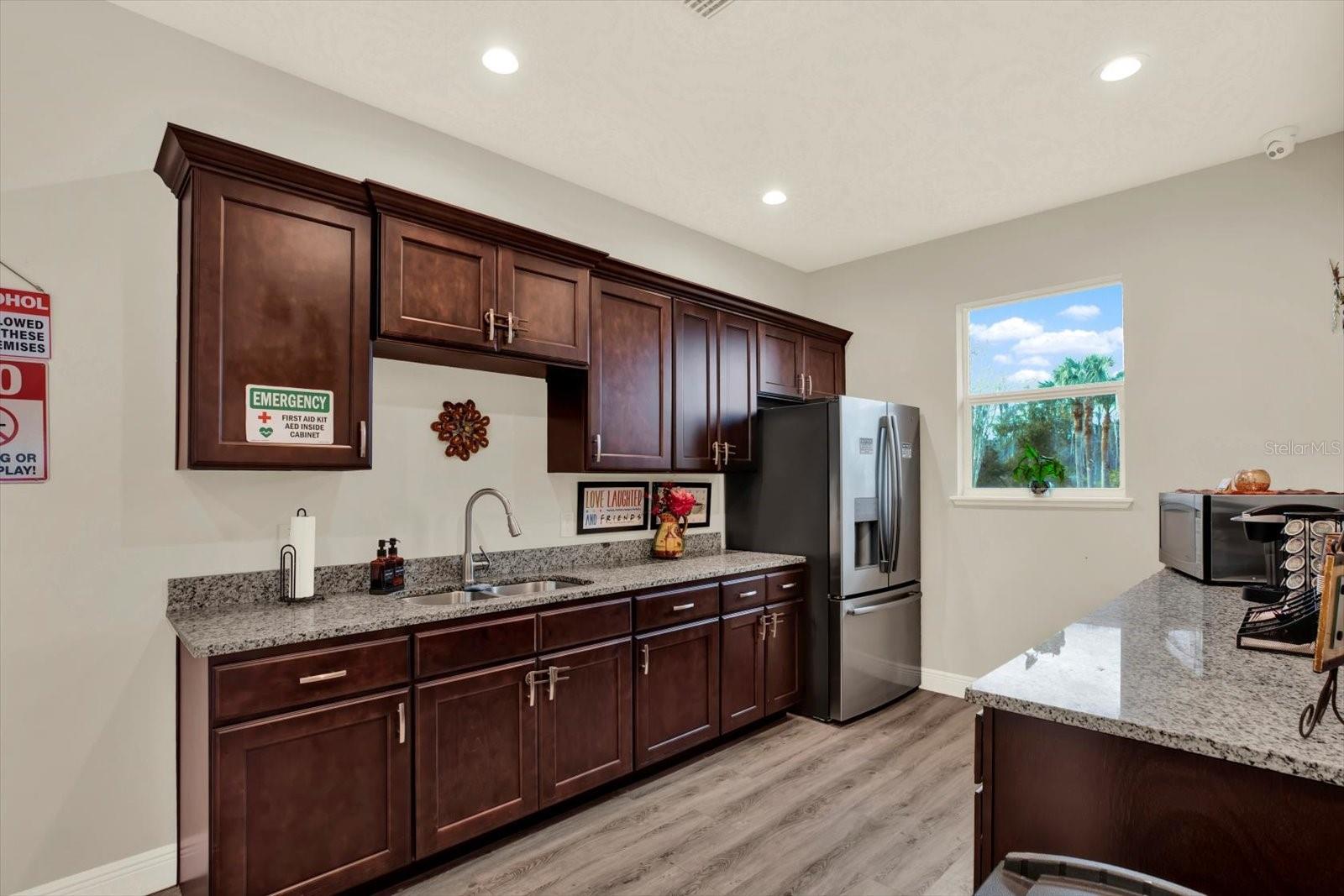 Recreation center with kitchen and gathering space