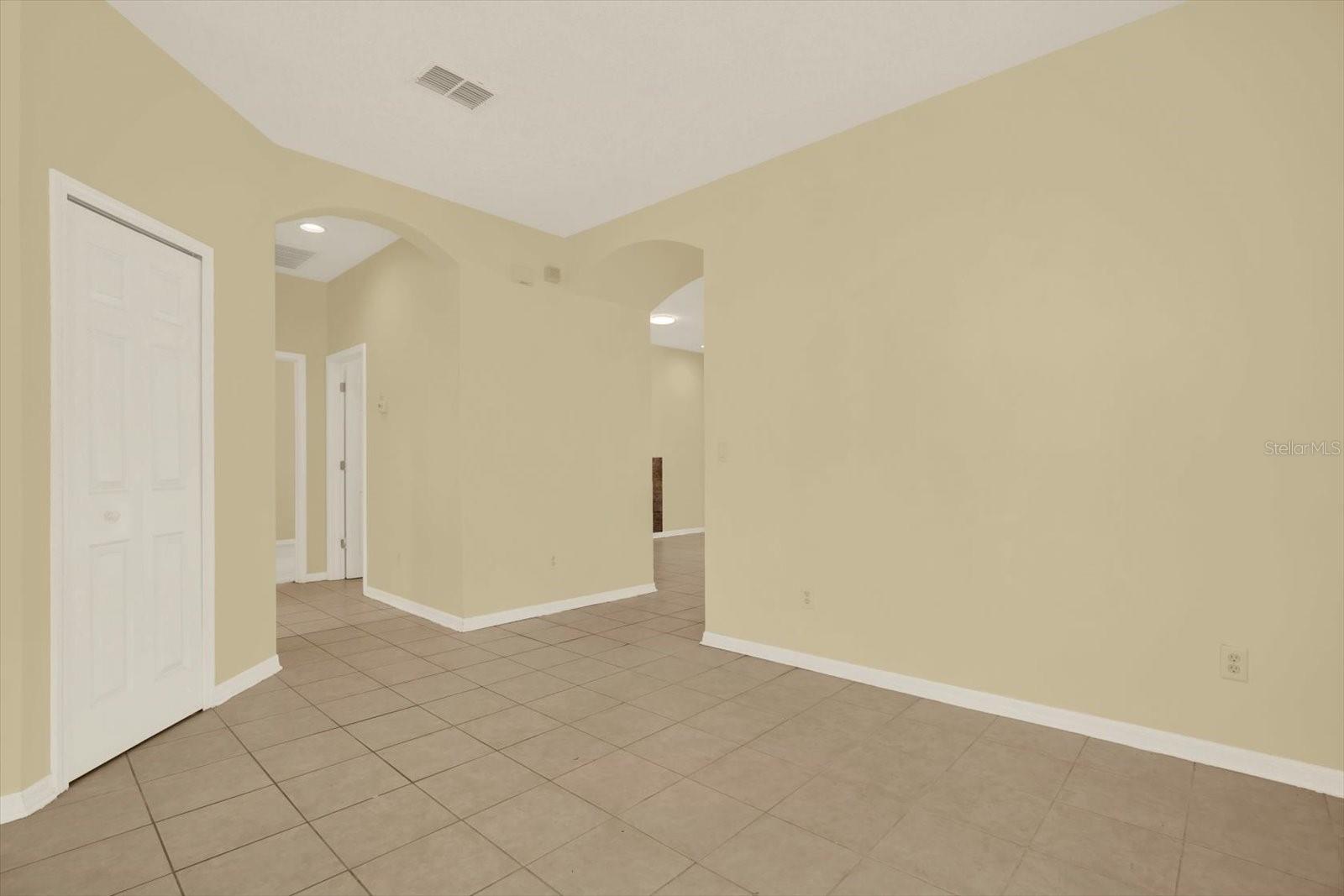 Front door view to bedrooms & to kitchen/family room