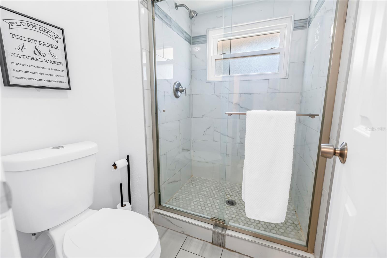 Separate shower and water closet