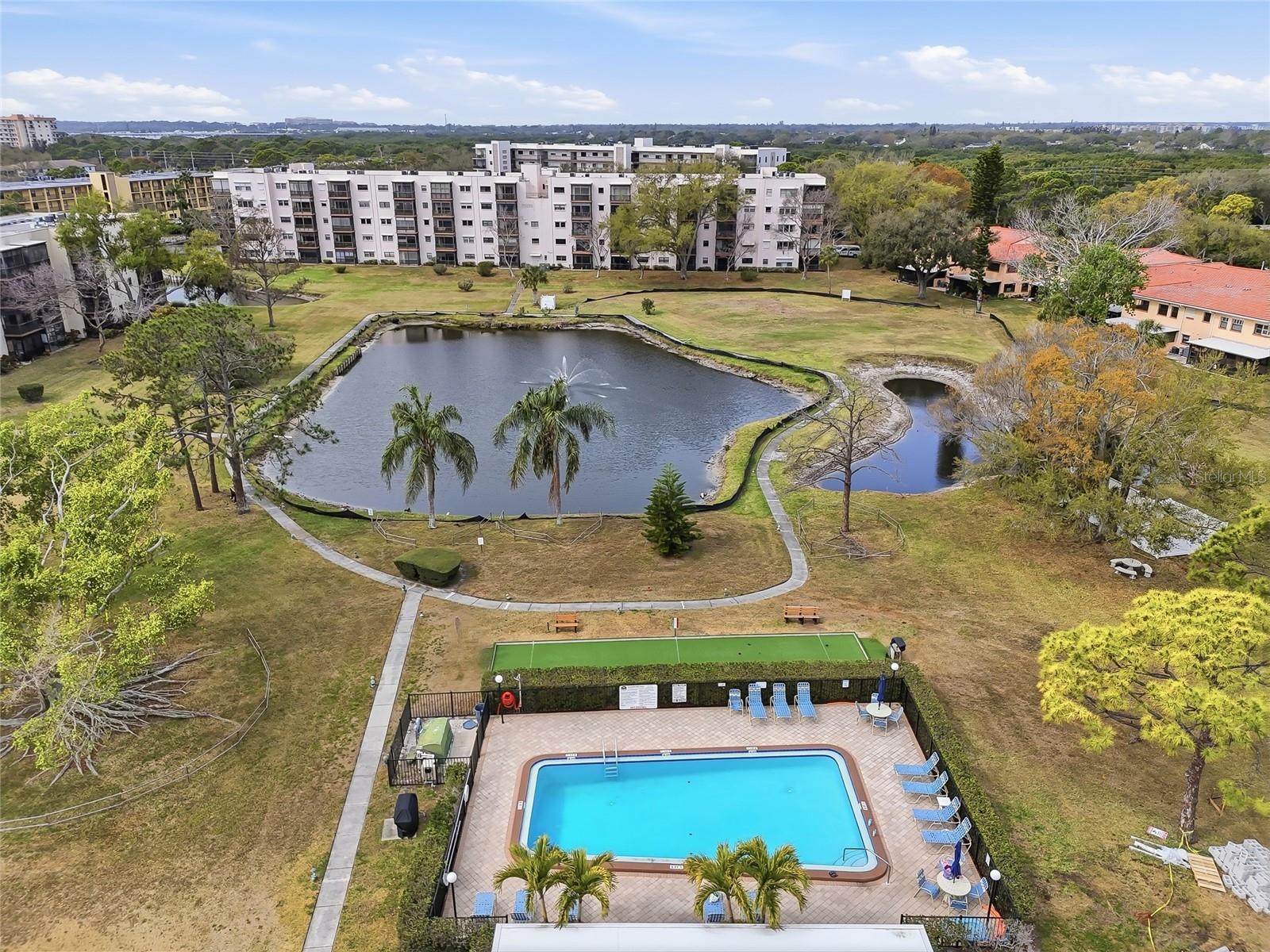 1 of 6 pool areas with a scenic lake backdrop—relaxation comes standard.