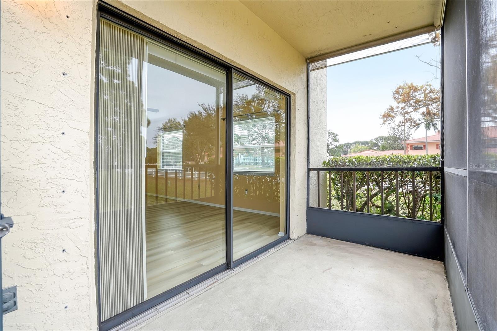 Screened lanai just off the living area—perfect for indoor/outdoor living.