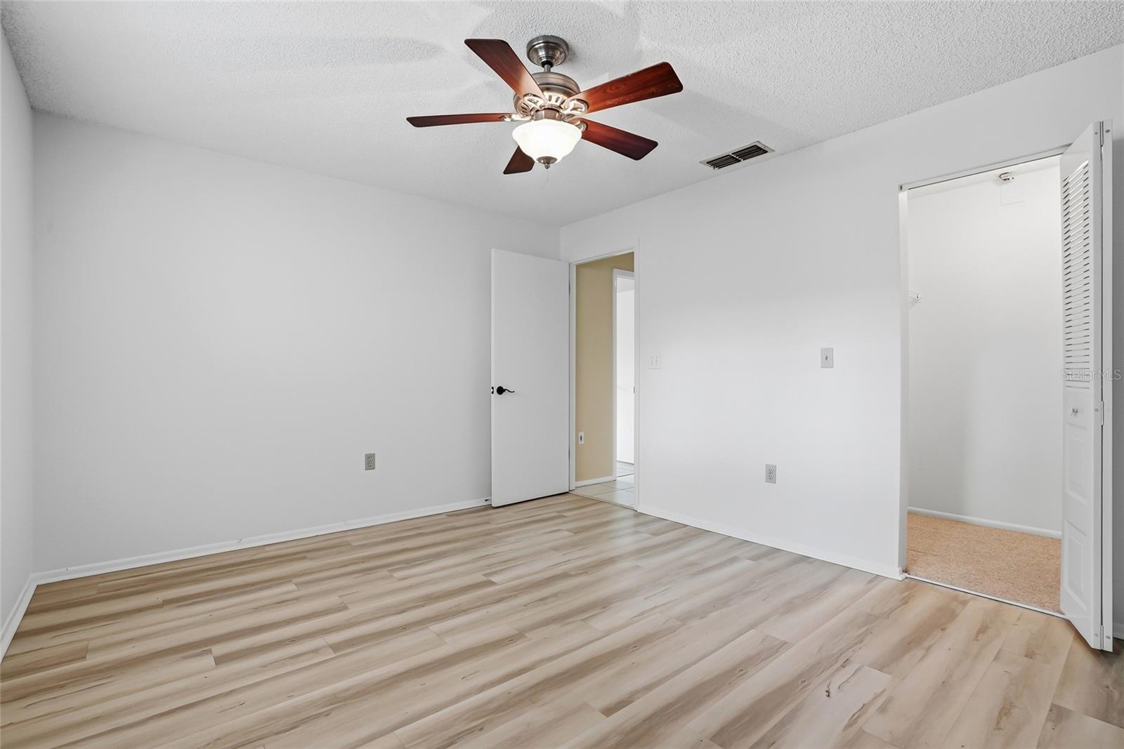 Flexible guest bedroom, perfect for guests, office, or hobby space.