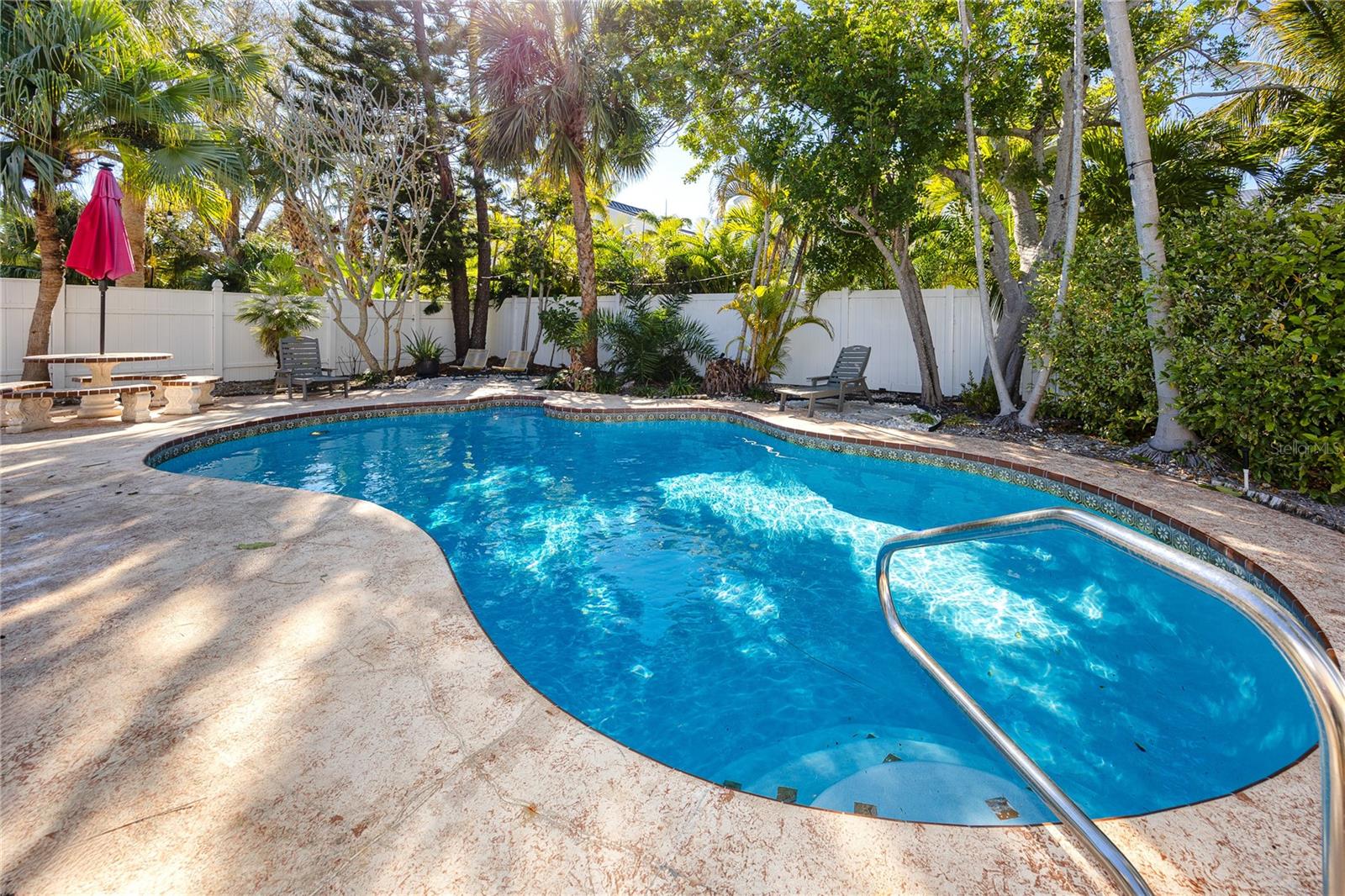 Solar heated pool with a deep end