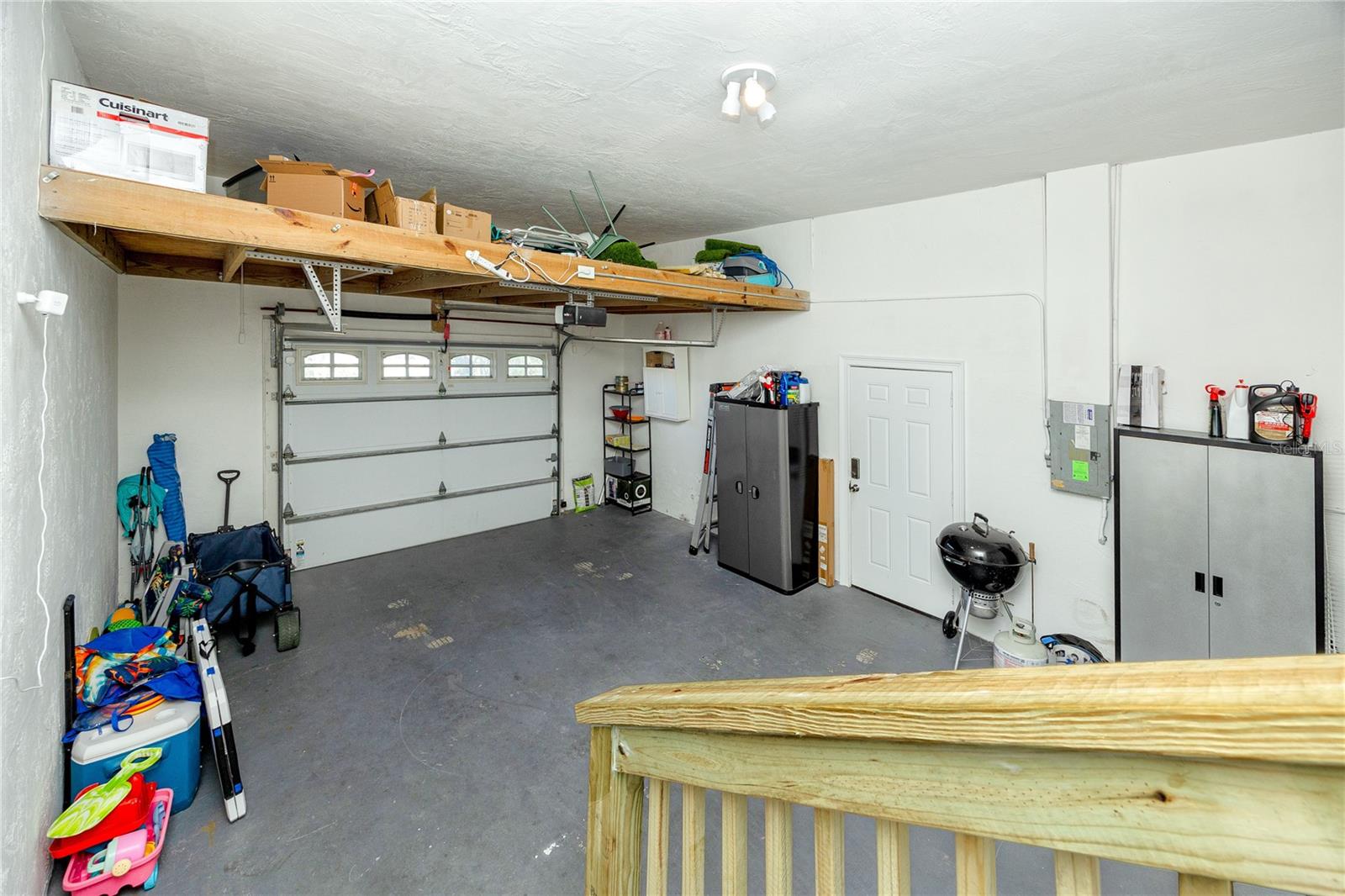 Garage with additional overhead storage