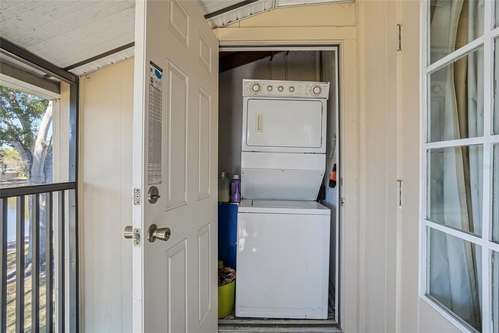 Washer and Dryer in Closet on Back Porch