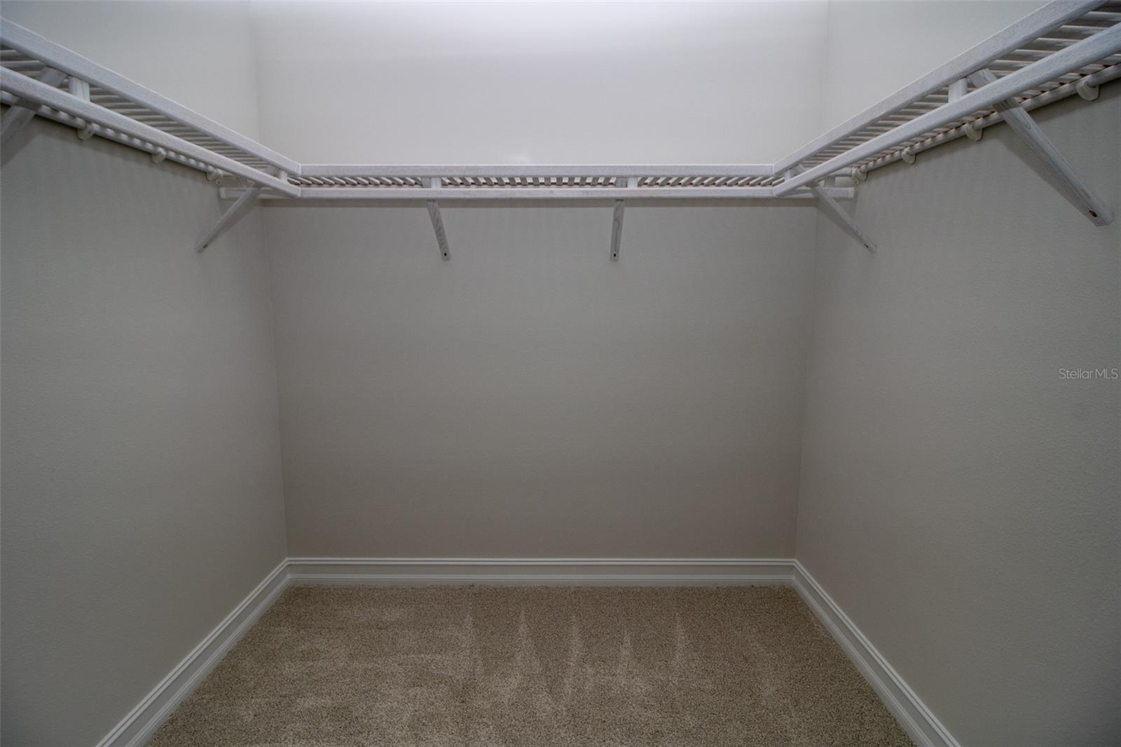 Primary bedroom closet 1