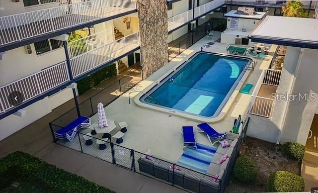 quiet beautiful pool with couches for reading and relaxsation
