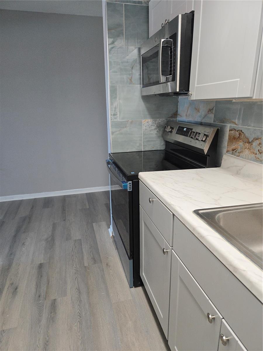 All new appliances, cabinets, and backsplash.