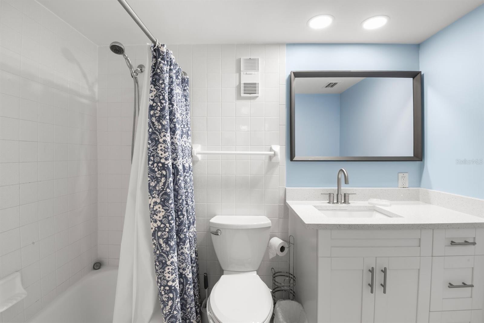 Guest bathroom with tub