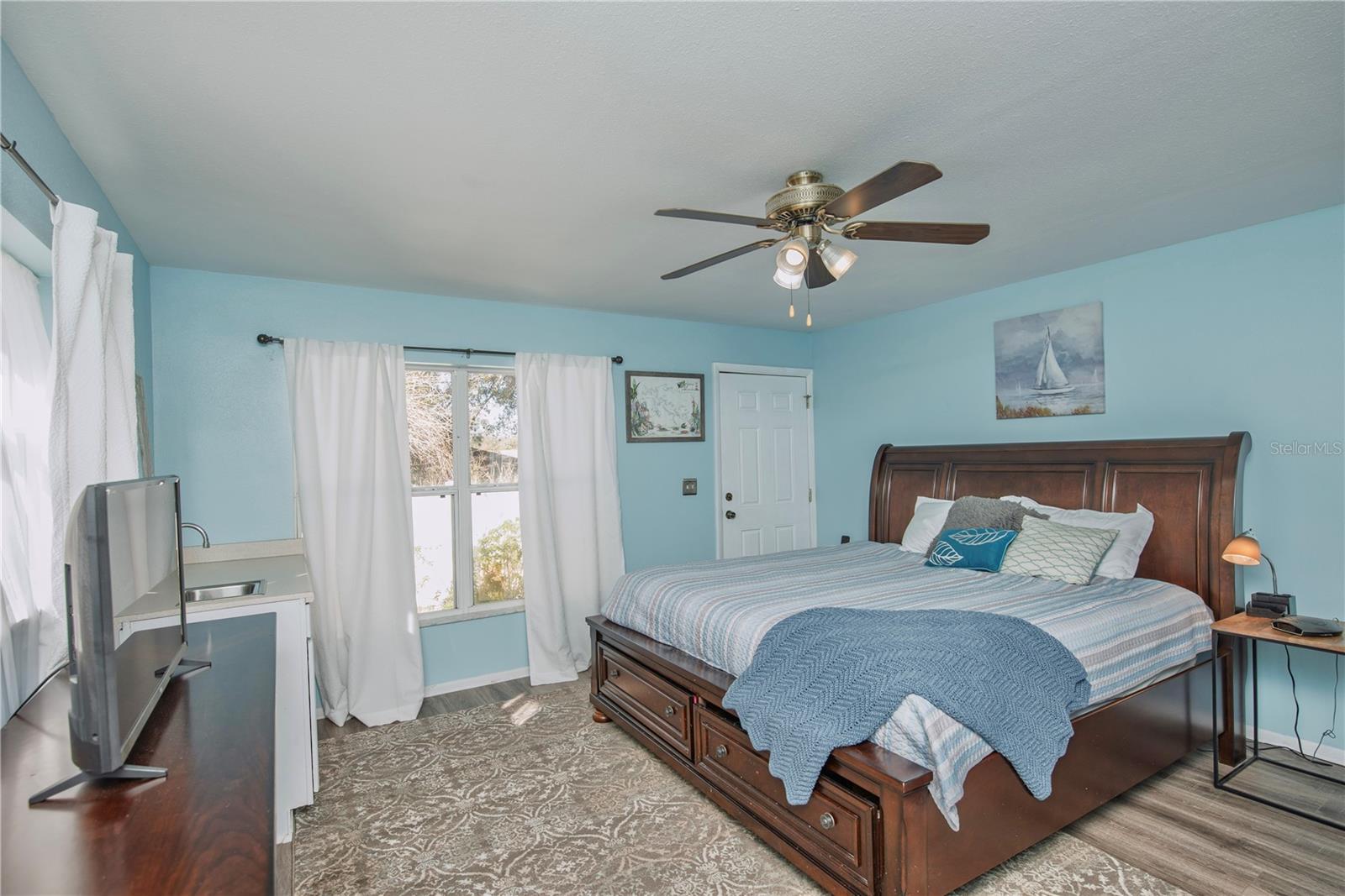 Use as an in-law suite or primary bedroom.