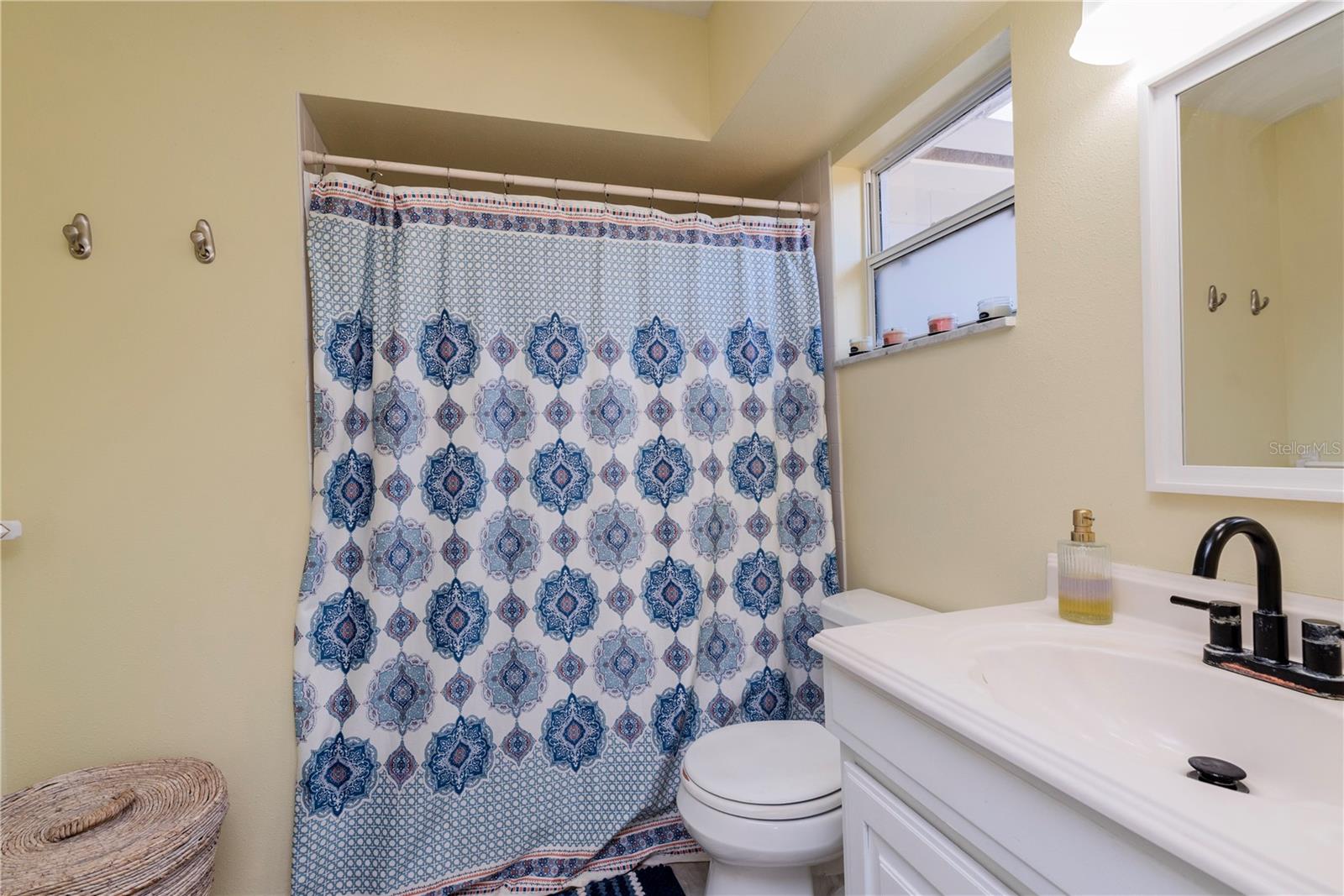 In-law ensuite bathroom with walk-in shower.