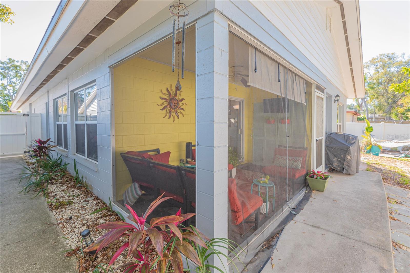 Screened lanai, right rear of home.