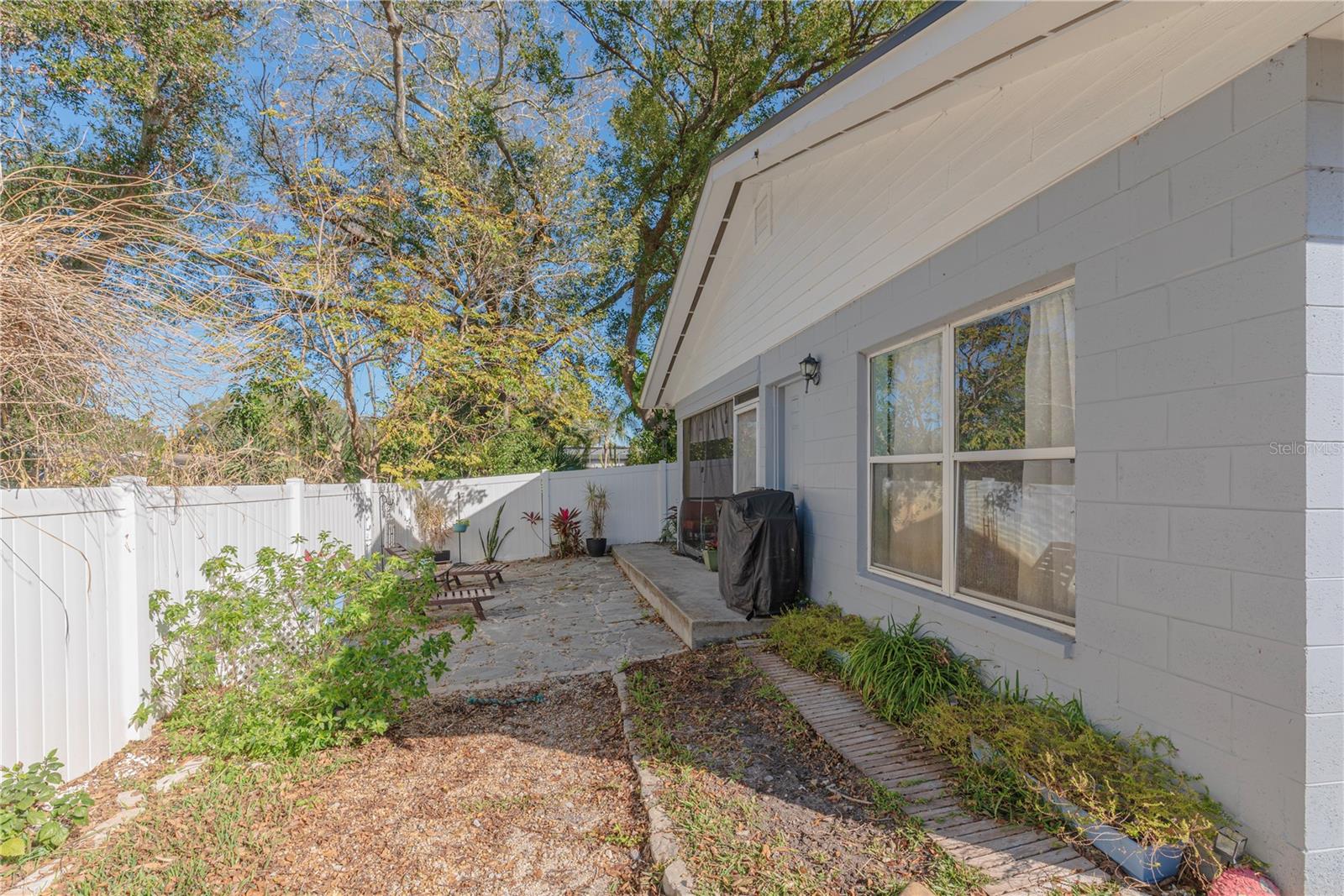 Back yard and entrance to in-law suite.