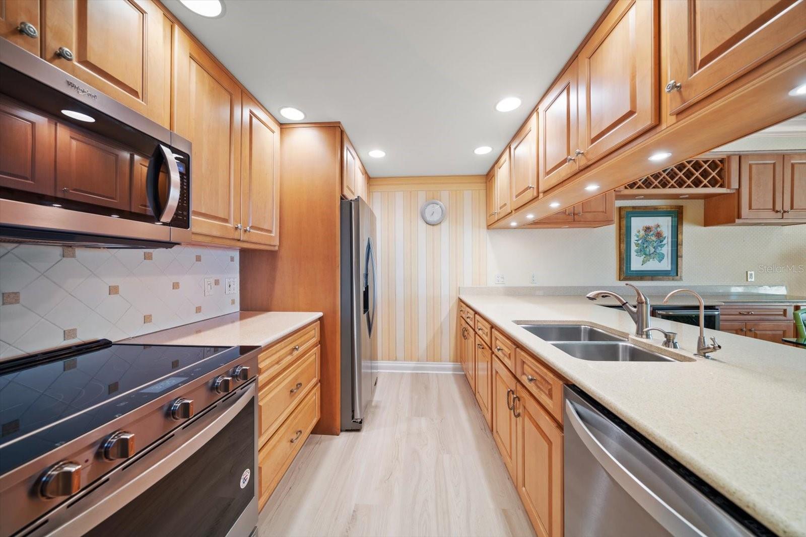 Fully equipped kitchen with newer appliances.