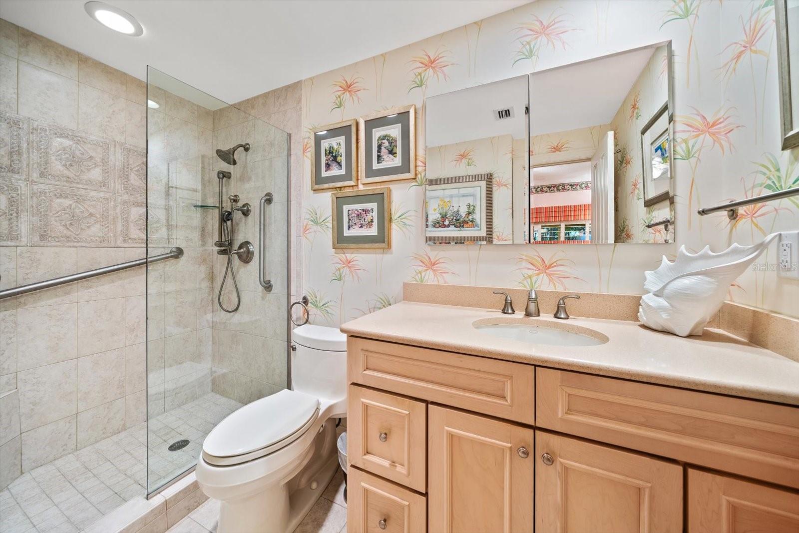 Walk in shower in bathroom on ground level suite 1.