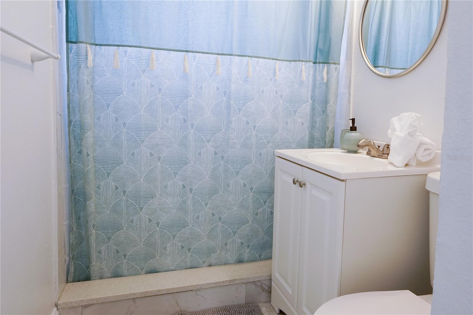 Clean and well maintained secondary bathroom with updated fixtures and functional layout.