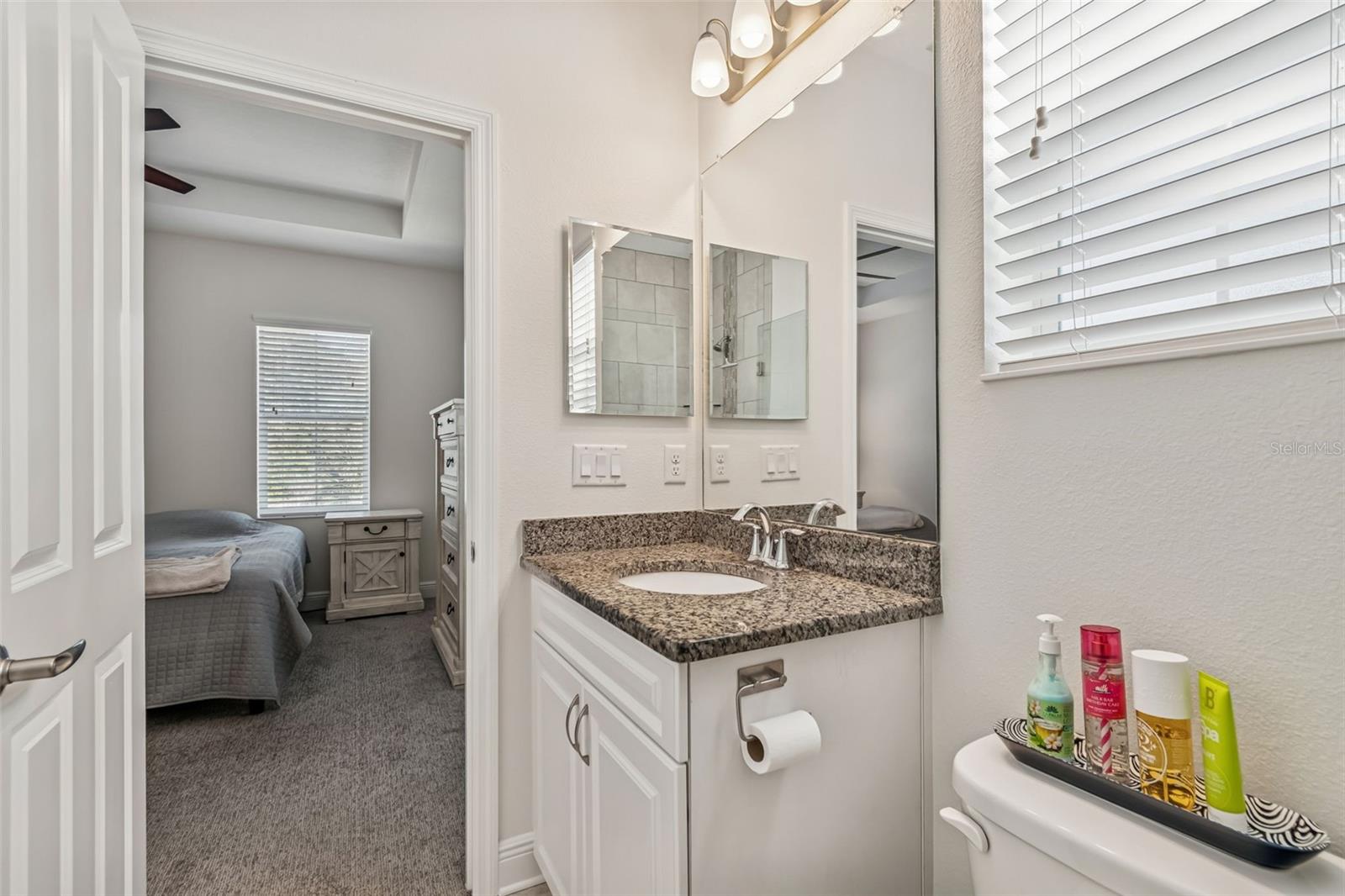 A practical layout with a direct connection to the primary suite, making daily routines smooth and convenient.