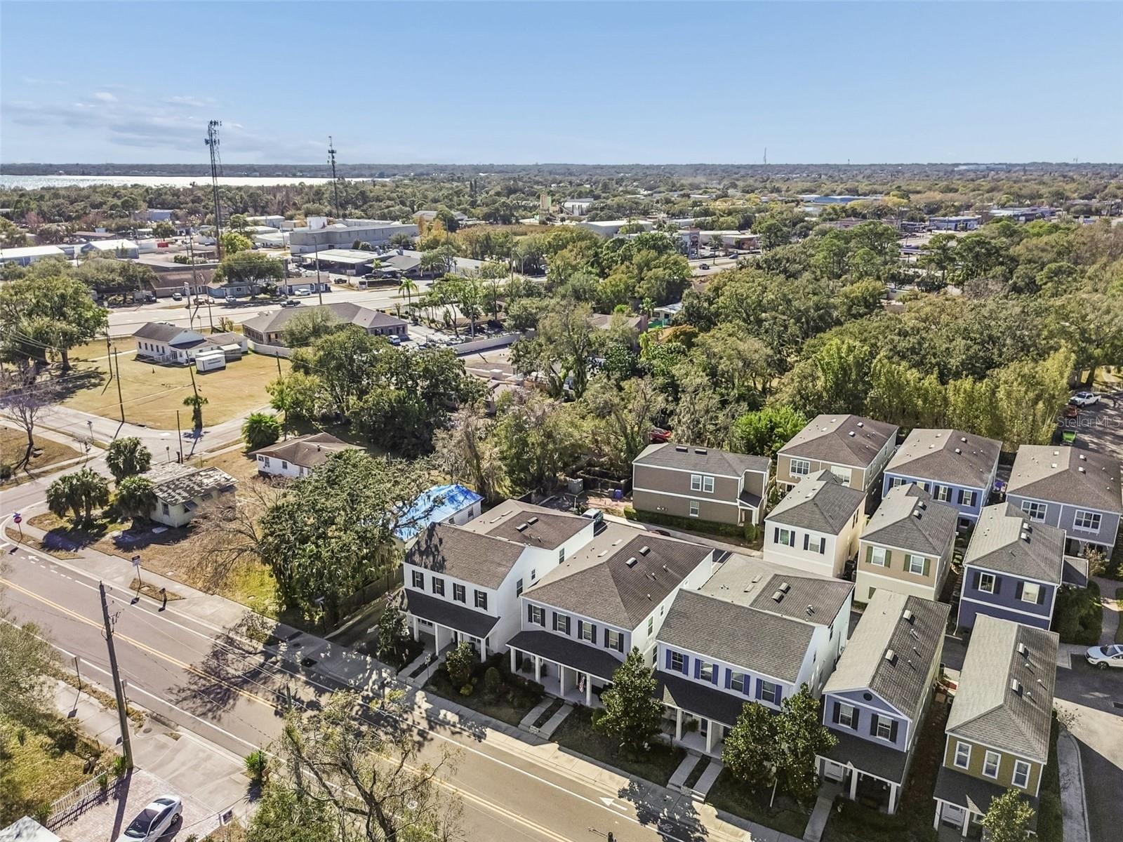 Central location with sidewalks, green buffers, and cohesive streetscapes offering a modern yet cozy neighborhood feel.
