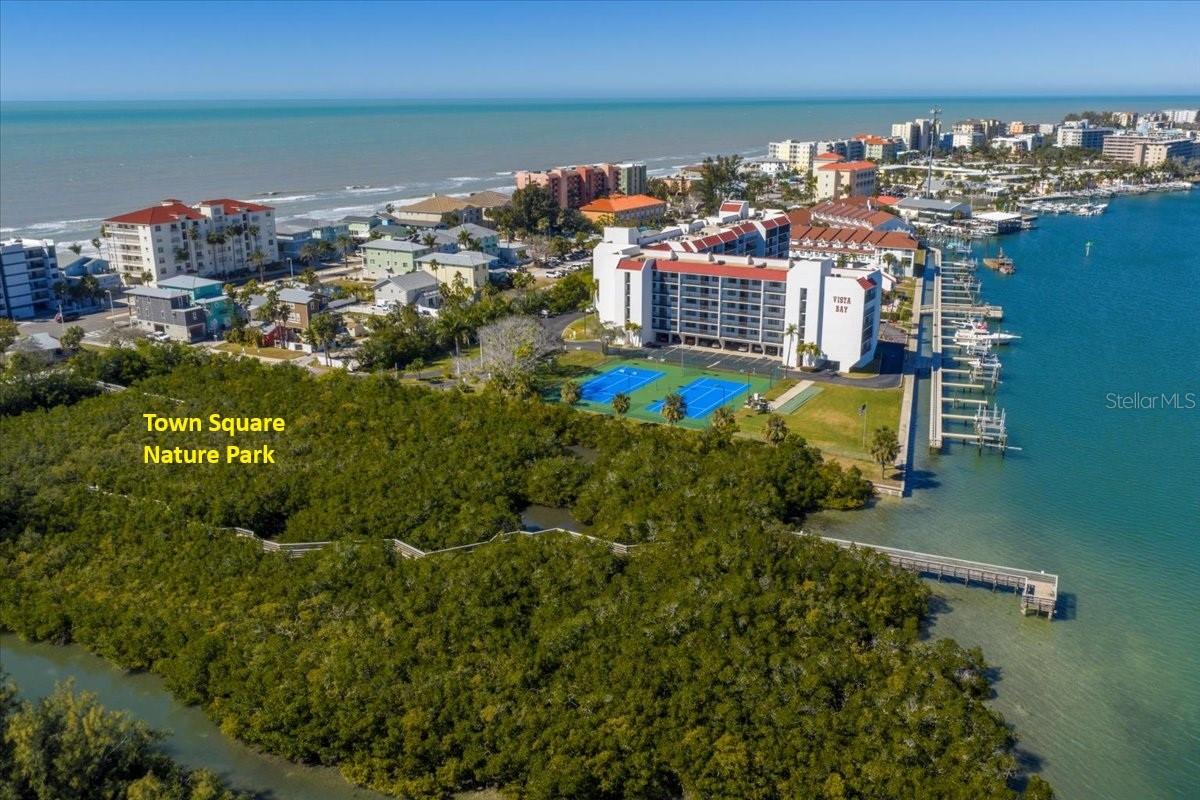 Vista Bay sits on a spacious 3-acre waterfront lot buffered on the South by Town Square Nature Park!