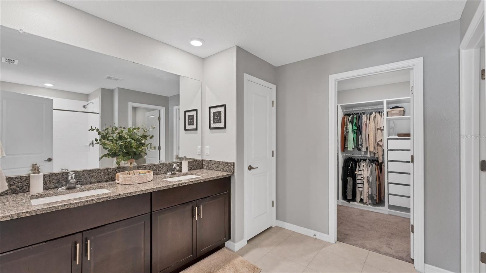 Primary Bathroom with custom walk-in closet