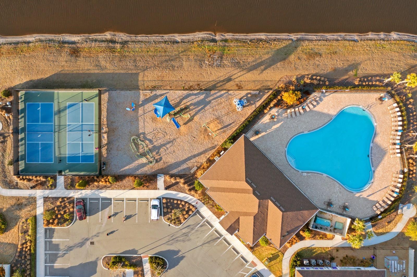 Neighborhood Amenities pool,tennis/pickleball, playground, clubhouse