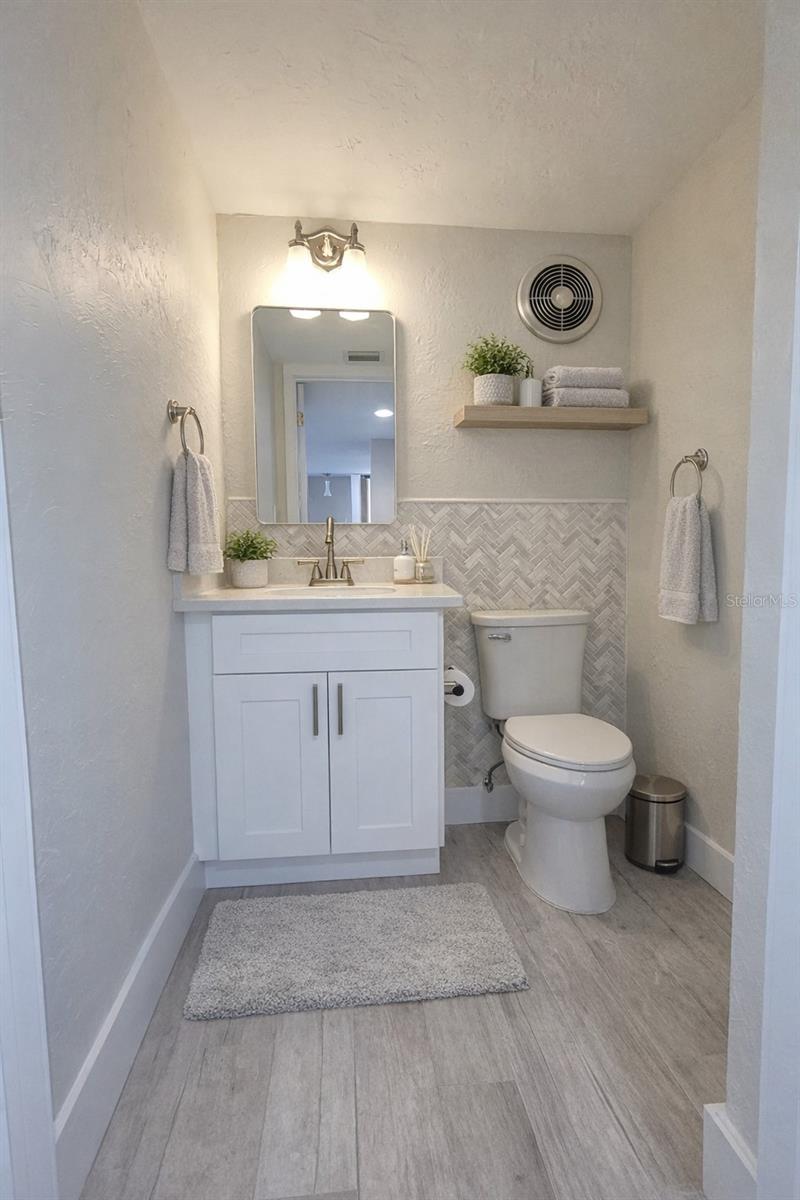 Half bath off of the living room