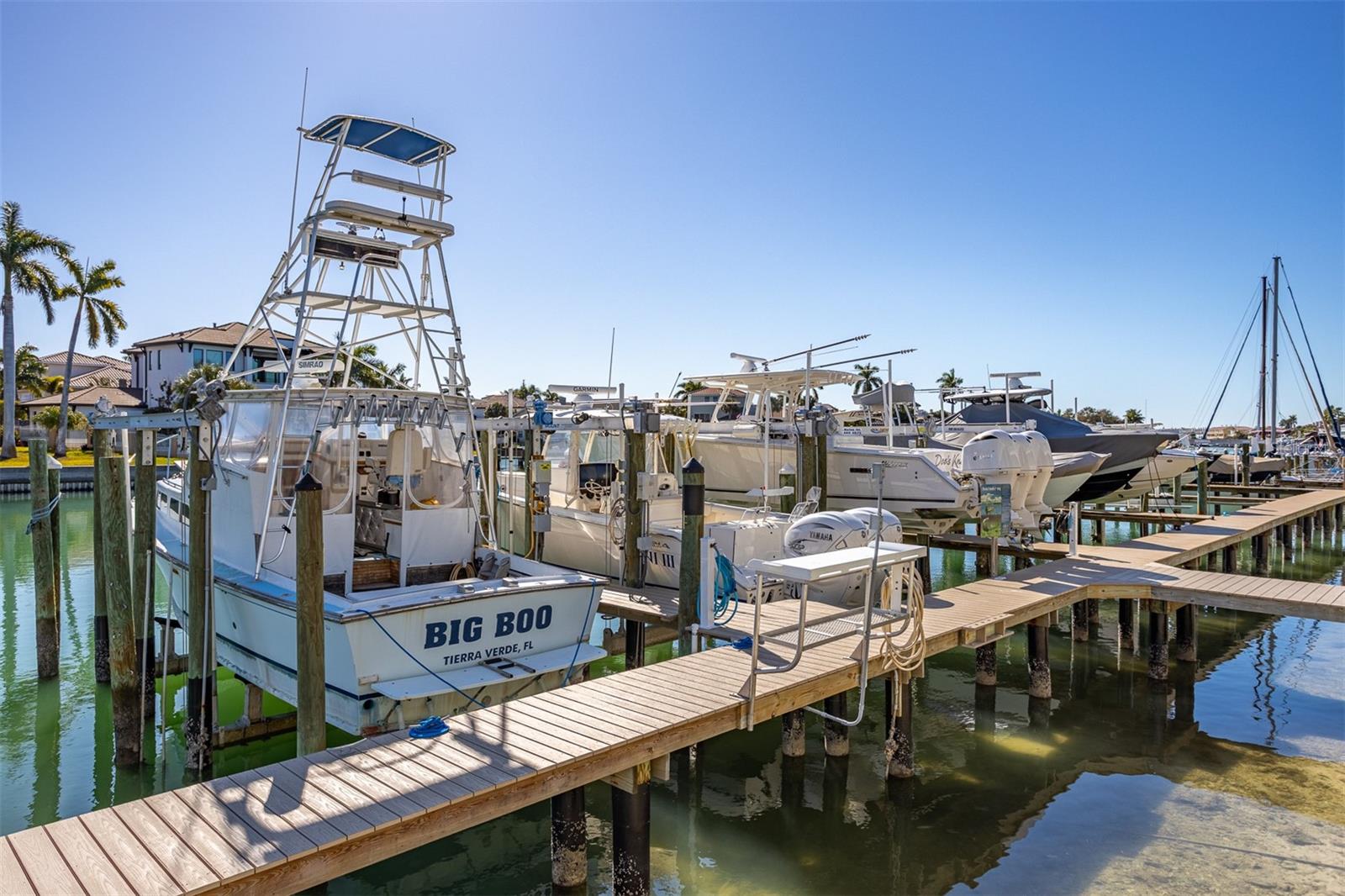 Community boat dock and fish cleaning table