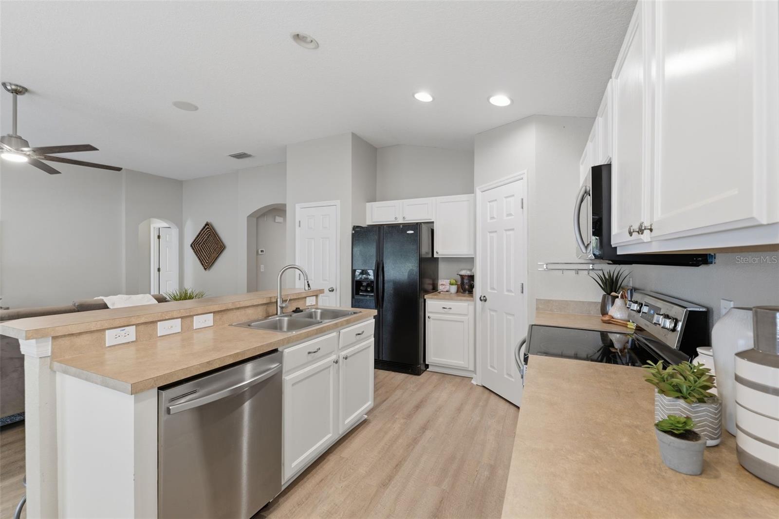 Open kitchen with a generous island and plenty of prep space.