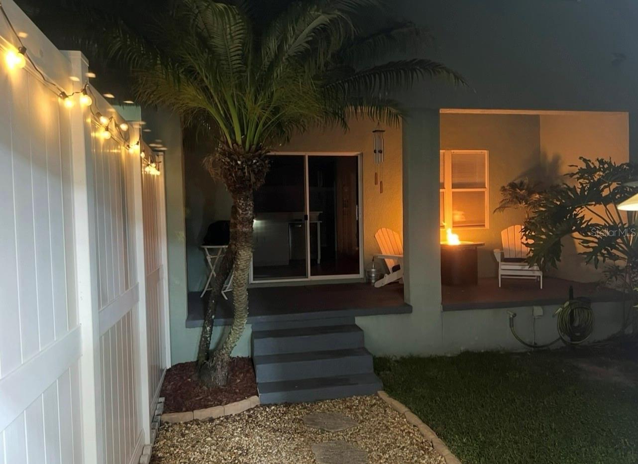 Private backyard leads to detached garage.