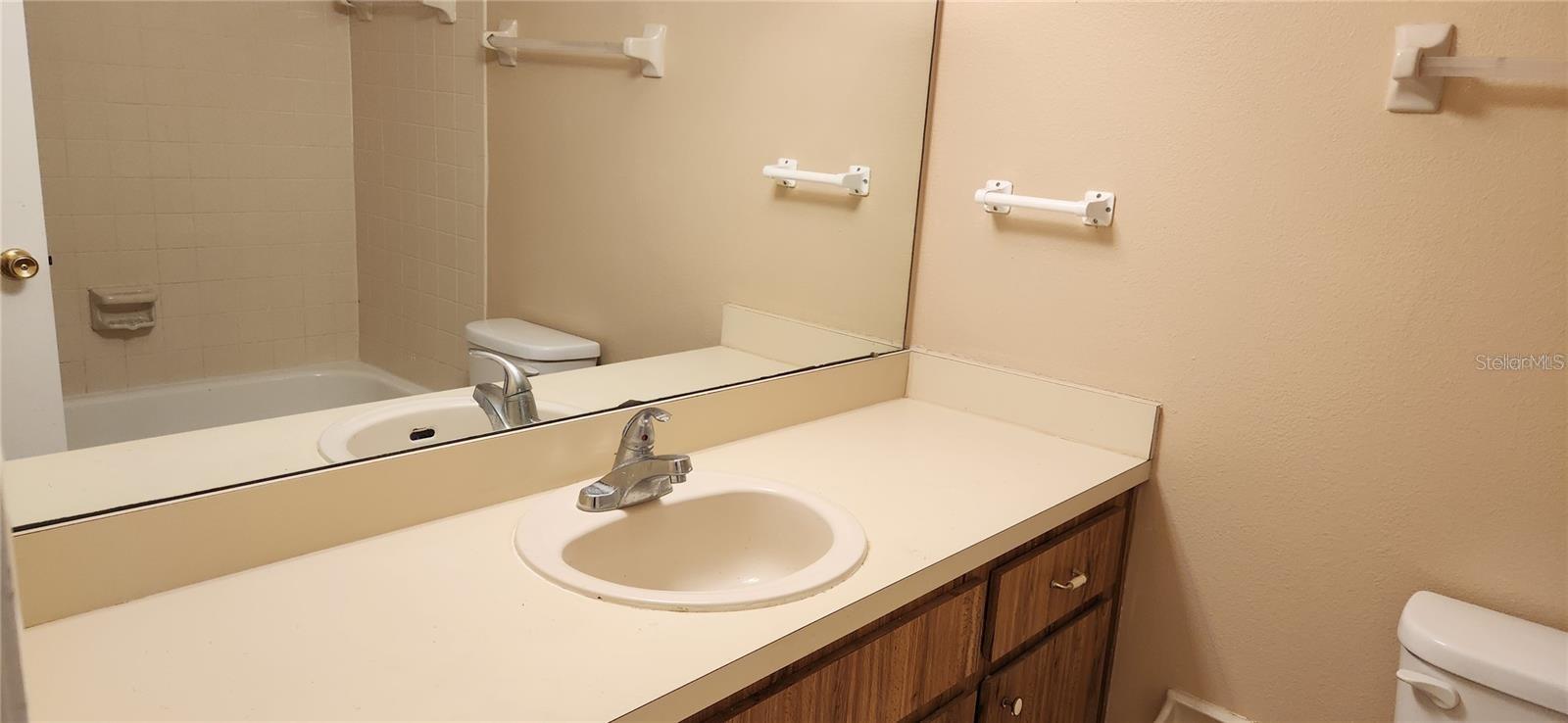 Bathroom 2 with tub and overhead shower