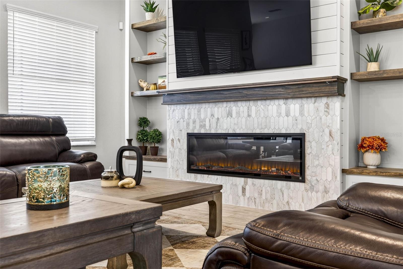 Wood accented shelving and tiling make this decorative and functional.