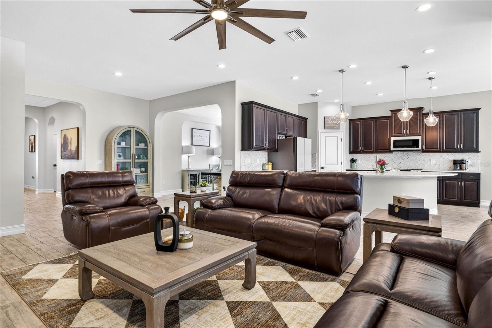 The living area stays connected to the kitchen.