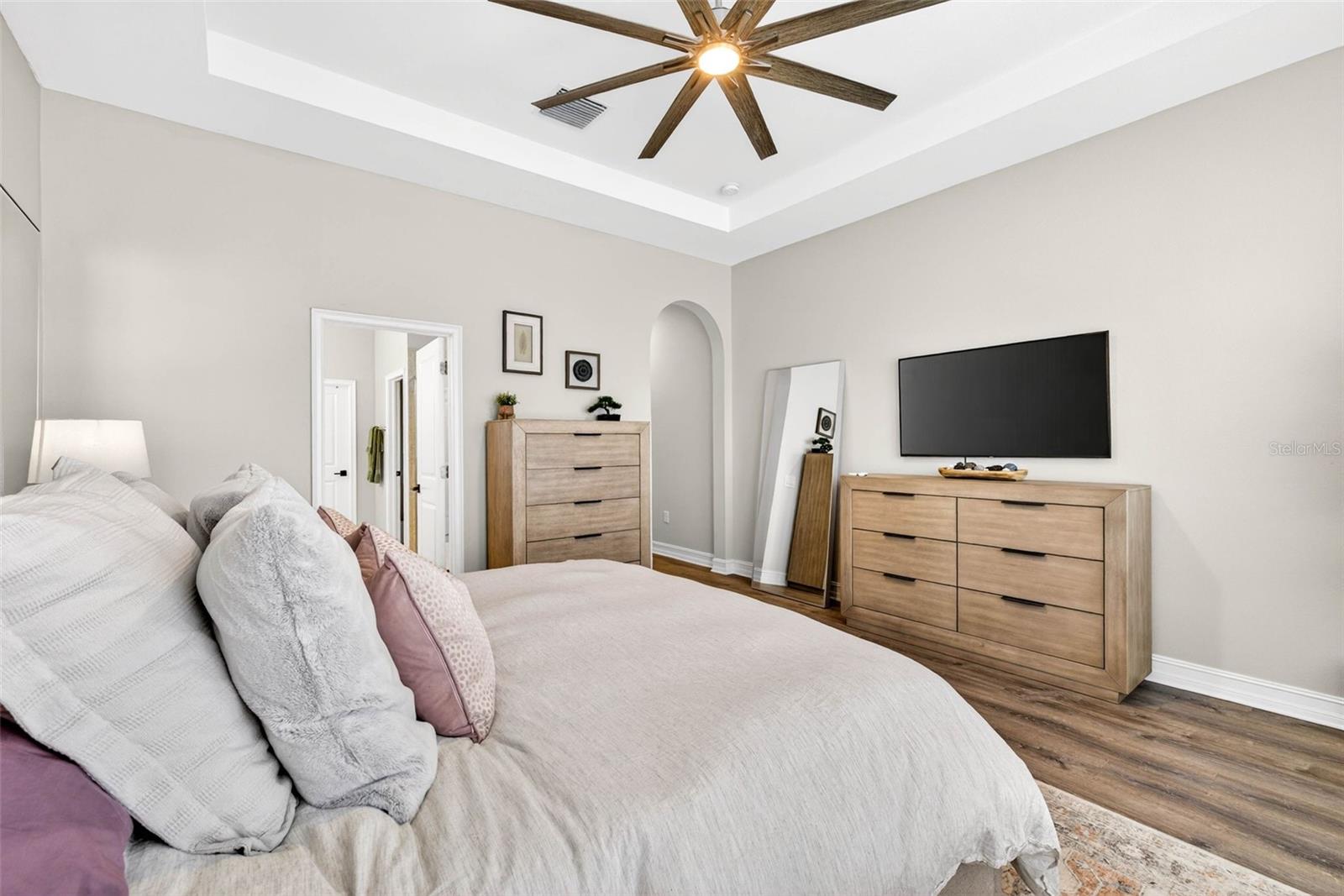 Updated flooring, overhead fan, & plenty of room.