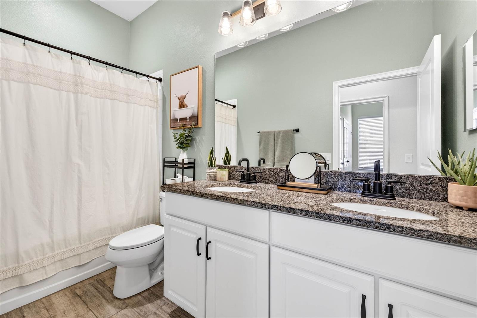 Full bathroom 2 shared by bedrooms 2 & 3