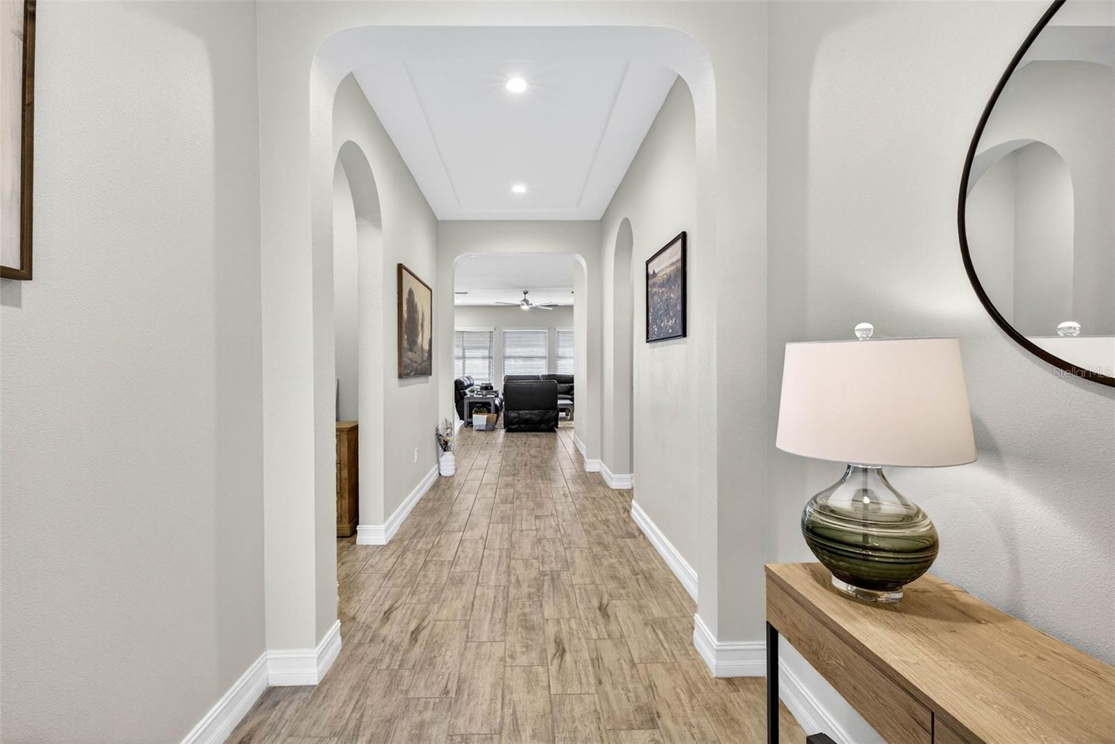 To the left, a bedroom with ensuite, to the right, two bedrooms & 1 bath.