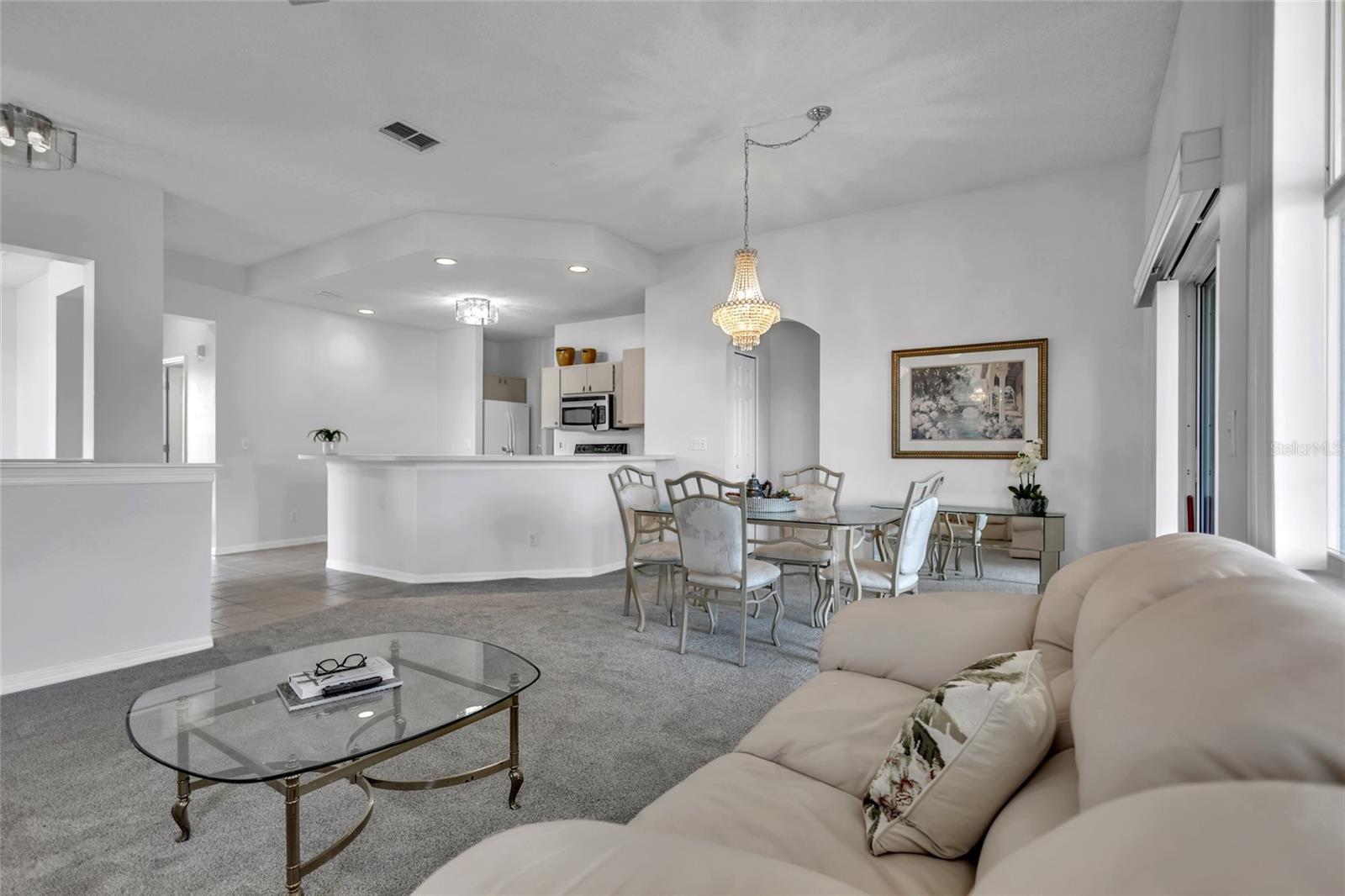 Open floor plan is bright and airy.