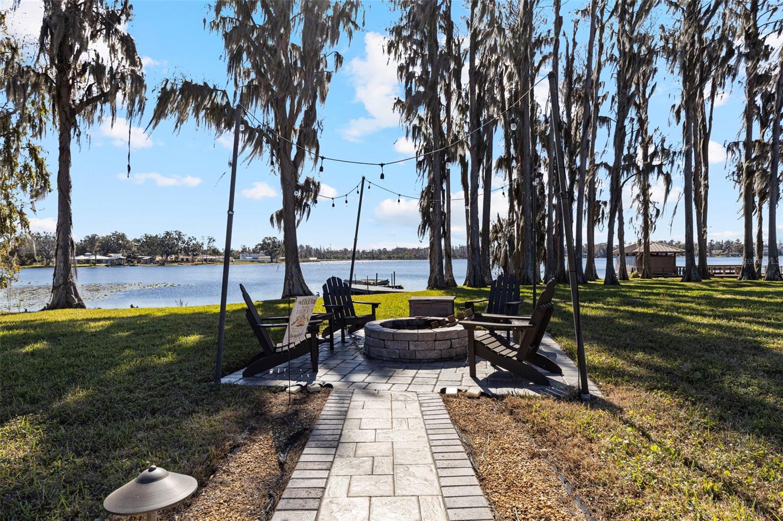 Fire pit with pavered walk way from house
