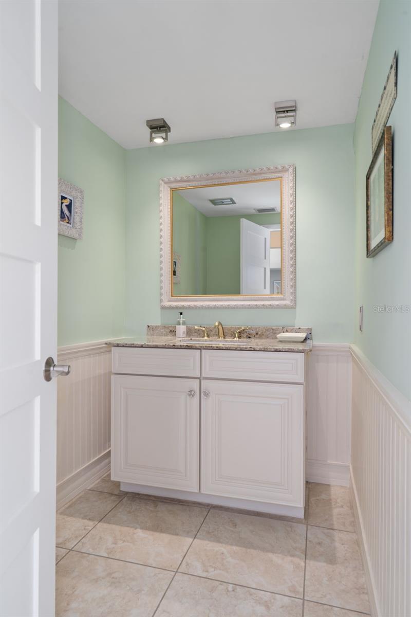 Powder bathroom off of the kitchen