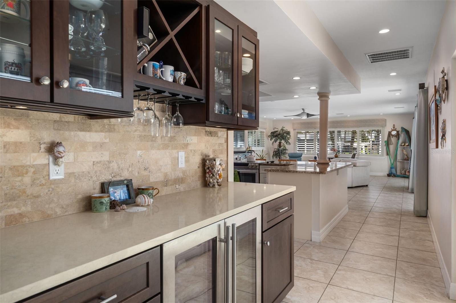 Updated kitchen with granite and a built-in butler's bar.