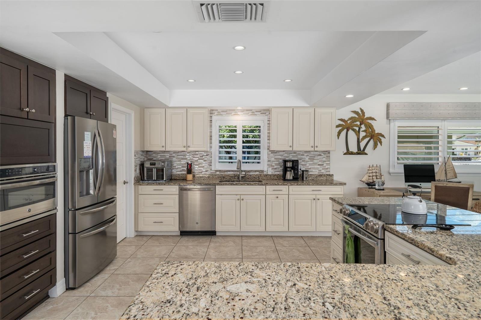 Spacious kitchen with granite countertops