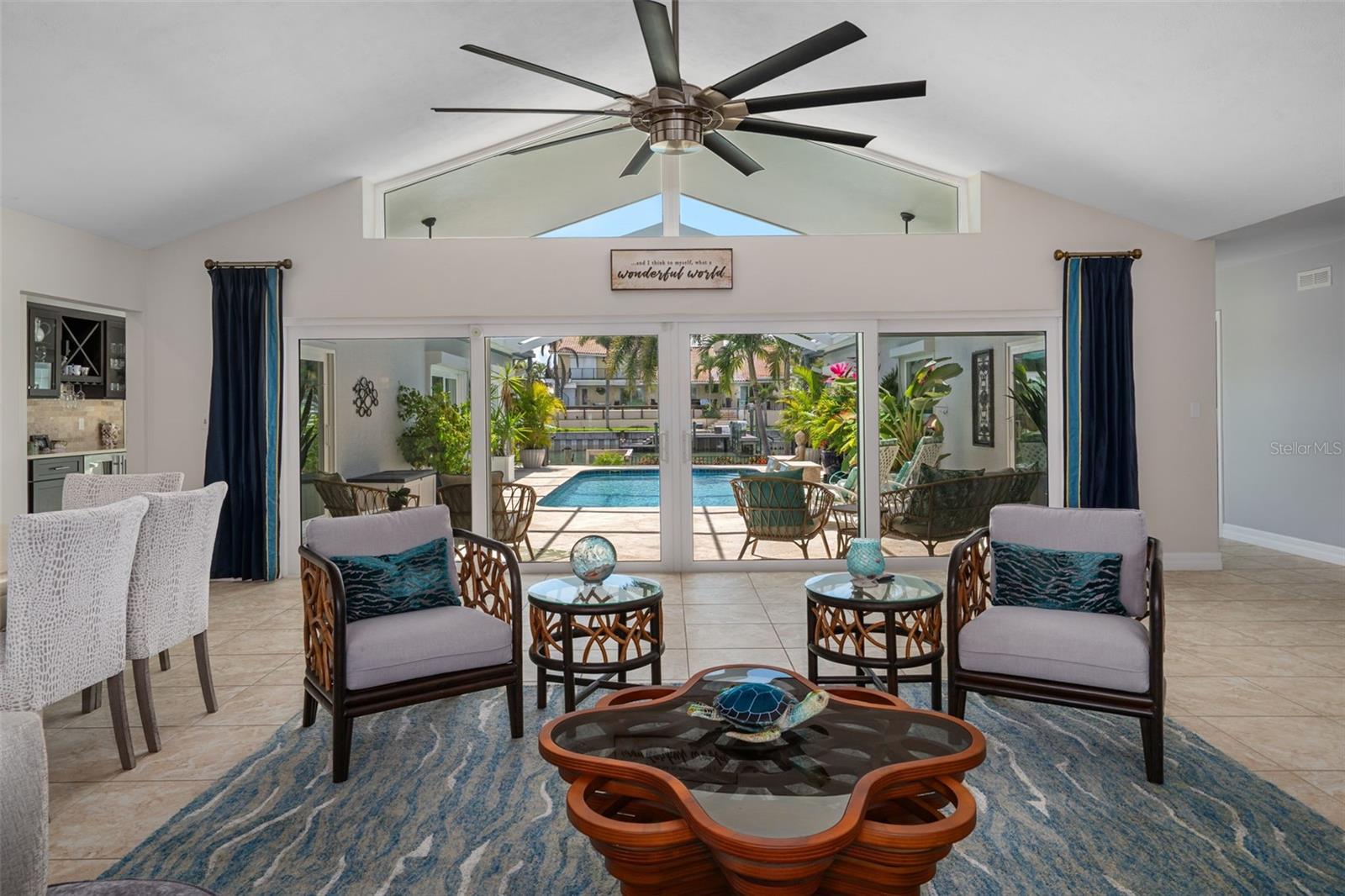 Bright, open front living area as you walk into the home with water views.