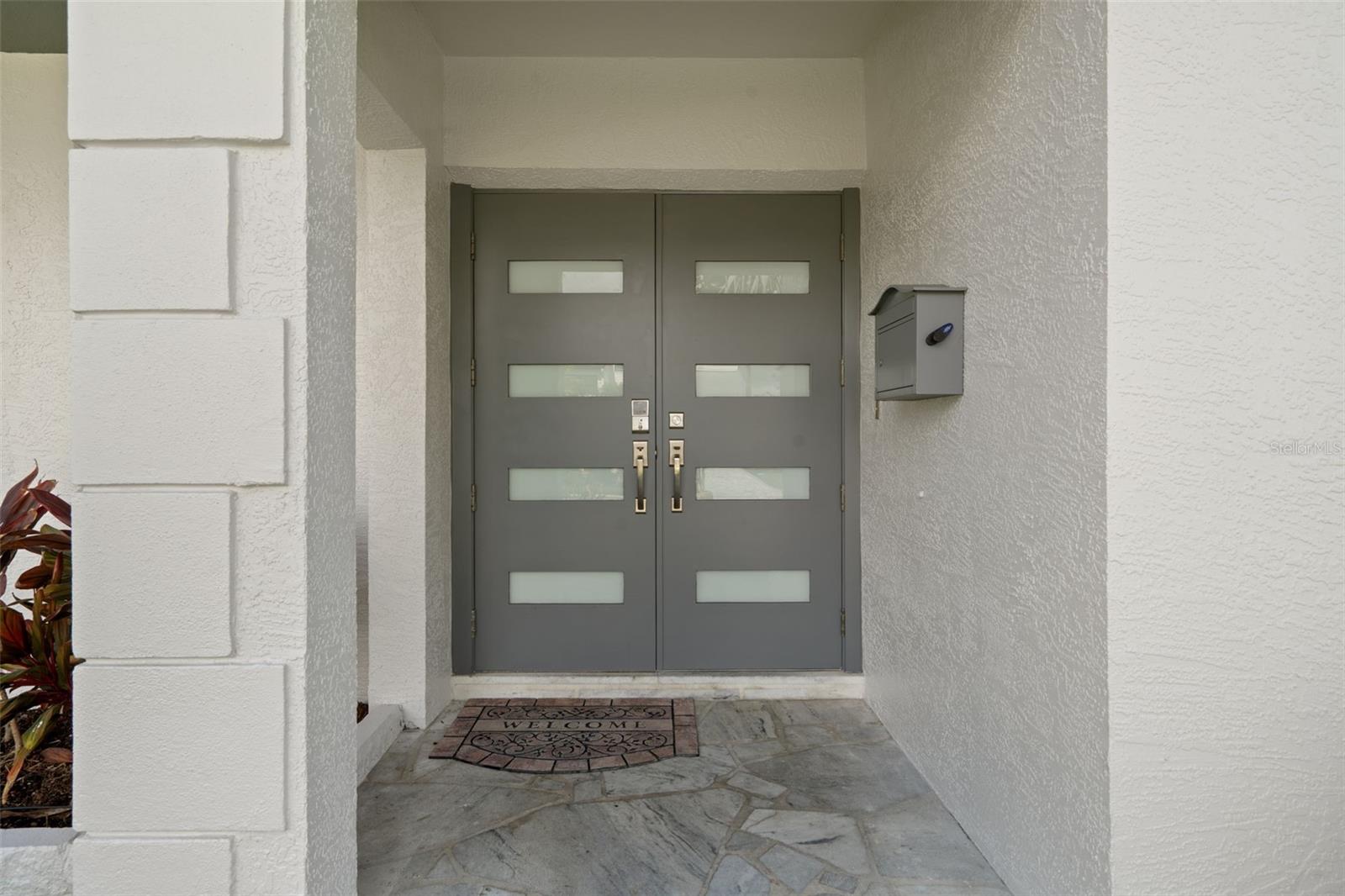 Welcoming front double doors.