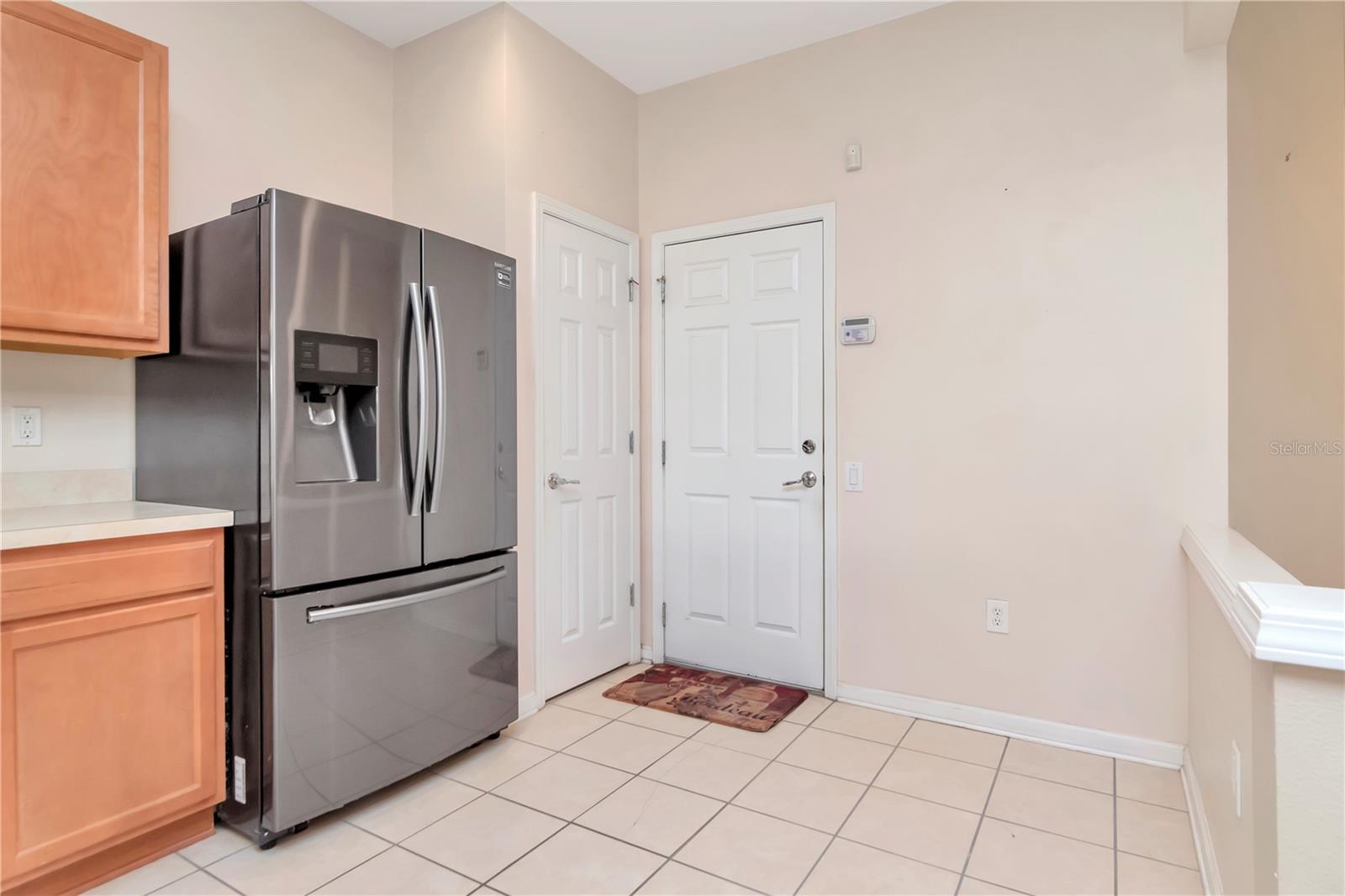 Kitchen Refrigerator with Door to Garage
