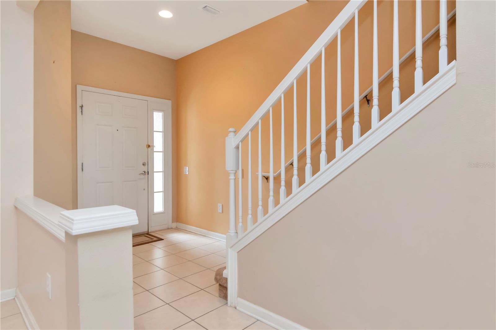 Front Door and Stairs to 2nd Floor