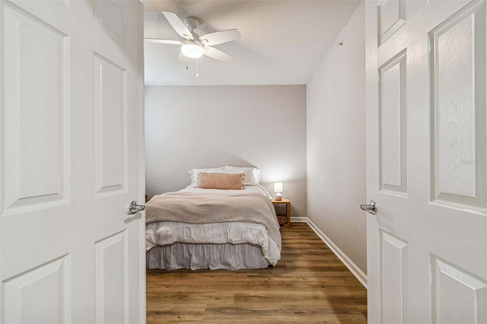 Double-door entry reveals a versatile room perfect for a home office, guest room, or flex space.