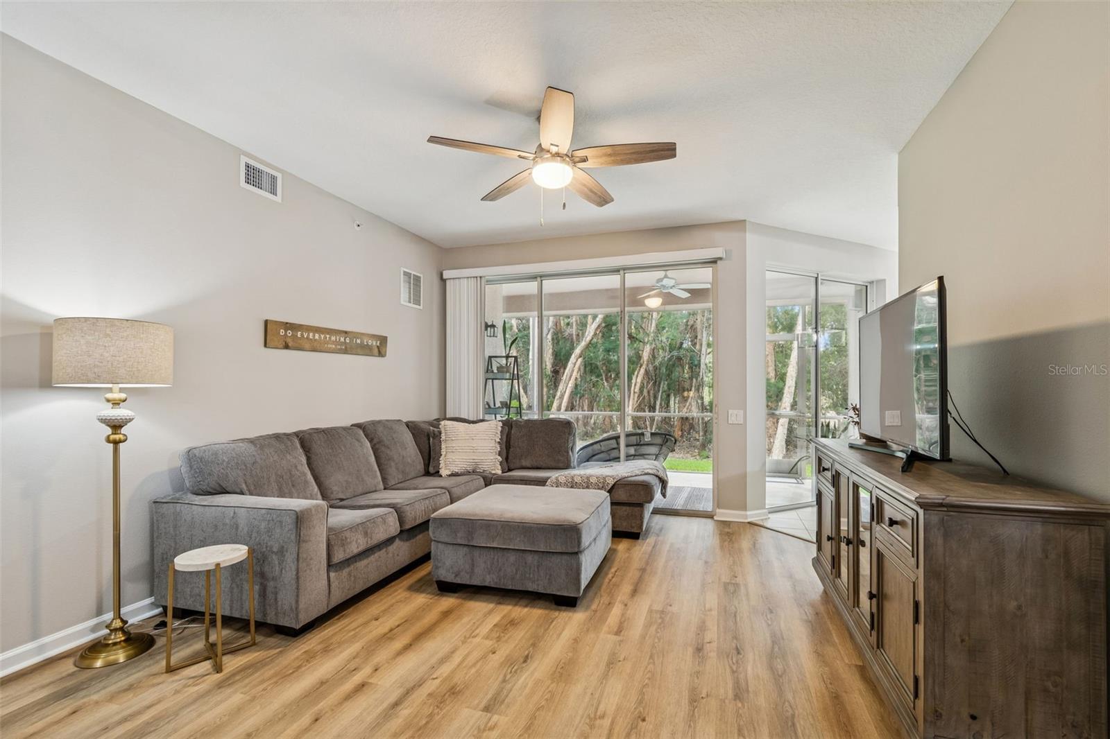 Cozy yet refined, this space features soft neutral walls, warm-toned floors, and elegant lighting to enhance every gathering.