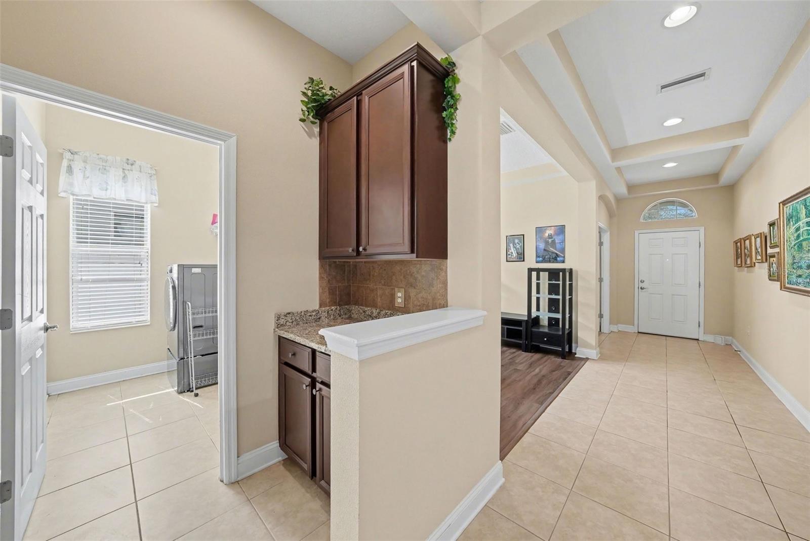 Hallway leads to Coffee Bar and Laundry Room